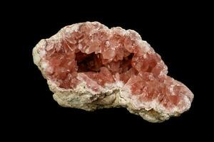 Macro mineral stone Pink Amethyst on a black background photo