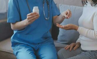 Mental health counselor. Young woman during therapy session talking with a psychologist in the office. photo