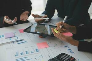 Entrepreneurs and business people conference in modern meeting room, happy multiracial coworkers have fun cooperating working together at office meeting, asian teamwork concept photo