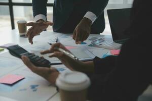 Entrepreneurs and business people conference in modern meeting room, happy multiracial coworkers have fun cooperating working together at office meeting, asian teamwork concept photo