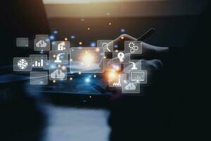 Big data analytics and business intelligence concept with chart and graph icons on a digital screen interface and a businessman in background photo