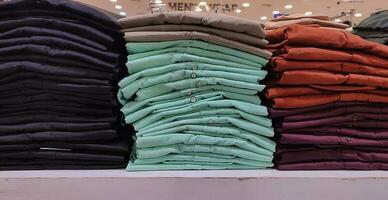 Pile of shirts at the store photo