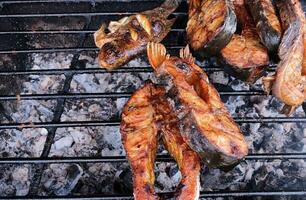 Grilled pangas catfishs, borneo special fish on the grill photo