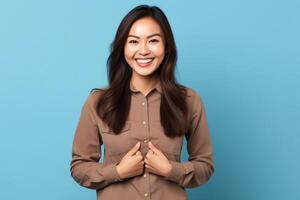 Beautiful asian woman in casual with smile cheerful. Studio shot asian woman standing hand gesture concept by AI Generated photo