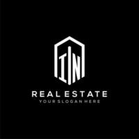 Letter IN logo for real estate with hexagon icon design vector