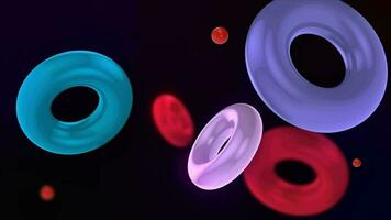 Abstract 3D background with colorful illuminated rings floating slowly. The rings float and collide smoothly. Floating Torus Loop Animation. Captivating Visuals in 4K. video