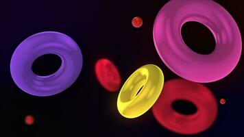 Abstract 3D background with colorful illuminated rings floating slowly. The rings float and collide smoothly. Floating Torus Loop Animation. Captivating Visuals in 4K. video