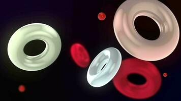 abstract 3d achtergrond met kleurrijk verlichte ringen drijvend langzaam. de ringen vlotter en botsen soepel. drijvend torus lus animatie. boeiend visuals in 4k. video