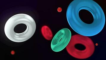 Abstract 3D background with colorful illuminated rings floating slowly. The rings float and collide smoothly. Floating Torus Loop Animation. Captivating Visuals in 4K. video