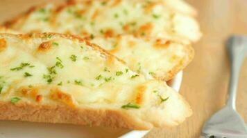 cheese bread with herbs on a white plate video
