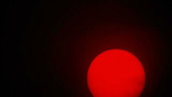 Red sun sphere in thick smog from forest fires video