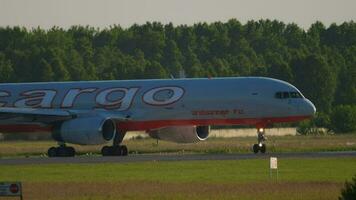 NOVOSIBIRSK, RUSSIAN FEDERATION JUNE 10, 2020 - Aviastar Cargo Boeing 757 VQ BKK turning from a taxiway to runway to depart from Tolmachevo Airport, Novosibirsk video