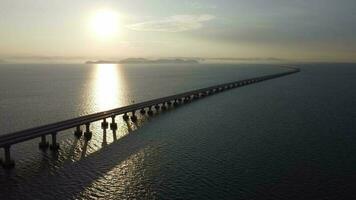 Morning sun light over Penang Second Bridge cross sea video