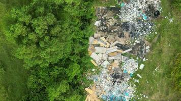 Aerial top down view Pile of trash in the middle of a mangrove forest video