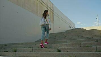 A girl climbing stairs in her shoes video