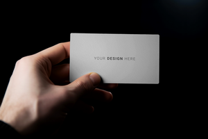 Hand Holding a Business Card Mockup psd