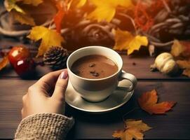 Autumn background with cup of coffee photo