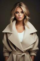 Fashion model girl in beige coat photo