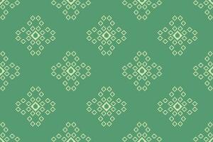 Ethnic geometric fabric pattern Cross Stitch.Ikat embroidery Ethnic oriental Pixel pattern four leaf clover green background. Abstract,vector,illustration. Texture,clothing,frame,motifs,wallpaper. vector