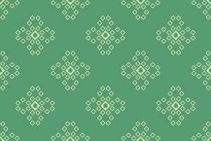 Ethnic geometric fabric pattern Cross Stitch.Ikat embroidery Ethnic oriental Pixel pattern four leaf clover green background. Abstract,vector,illustration. Texture,clothing,frame,motifs,wallpaper. vector