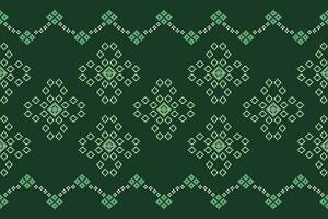 Ethnic geometric fabric pattern Cross Stitch.Ikat embroidery Ethnic oriental Pixel pattern four leaf clover green background. Abstract,vector,illustration. Texture,clothing,frame,motifs,wallpaper. vector