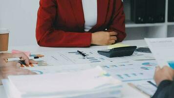 Team of business people working together in the meeting room office, teamwork background charts and graphs banner, double exposure successful teamwork,business planning concept. video