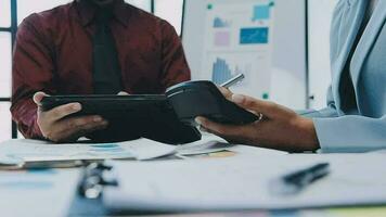 Team of business people working together in the meeting room office, teamwork background charts and graphs banner, double exposure successful teamwork,business planning concept. video