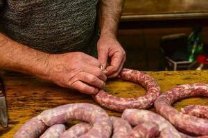 Homemade sausage making photo