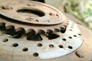 rusty old vespa motorbike tire wheel gears photo