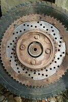 rusty old vespa motorbike tire wheel gears photo