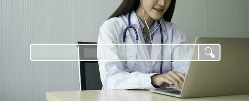 Searching browsing internet bar on Asian woman doctor is online visiting with a patient background, Concept of Searching Browsing Internet Data Information Networking for medical and healthcare photo