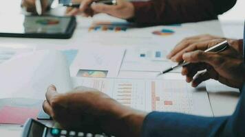 Team of business people working together in the meeting room office, teamwork background charts and graphs banner, double exposure successful teamwork,business planning concept. video