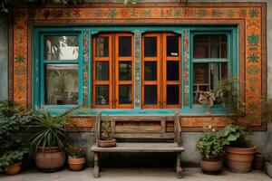 Intricately decorated wooden bench in front of a brightly colored building photo