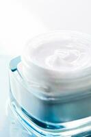 Skincare moisturiser cream in glass jar, luxury cosmetics and facial care product photo