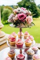 Cupcakes, cakes, scones and muffins and holiday decoration outdoors at the English country style garden, sweet desserts for wedding, birthday or party celebration, generative ai photo