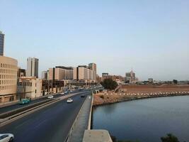 Jeddah, Saudi Arabia, June 2023 - A beautiful evening view of the main road and commercial buildings of Balad in Jeddah, Saudi Arabia. photo