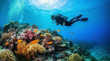 escafandra autónoma buzo con coral arrecife foto