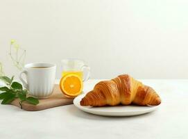 Breakfast with coffee and croissant photo