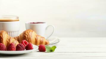 Breakfast with coffee and croissant photo