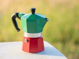 Moka Pot on the table in the morning photo