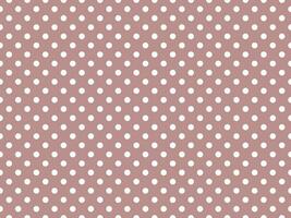 white polka dots over rosy brown background photo