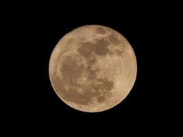 red supermoon seen with telescope photo