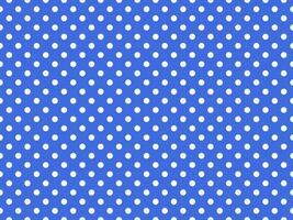 white polka dots over royal blue background photo