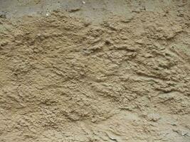 beige plaster wall background photo