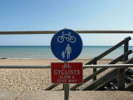 cyclists slow and give way sign photo