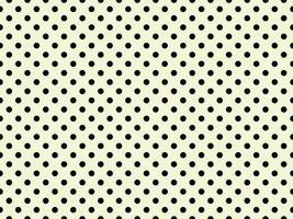 black polka dots over beige background photo