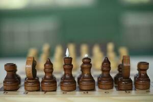 Chess on table. Strategy game. Chess pieces on board for game. photo