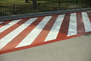 Platform for fire equipment. Parking for firefighters. Asphalt is painted in strips. photo