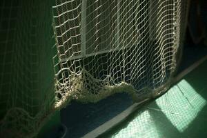 Net in gym. Mesh Details. Light in gym. photo