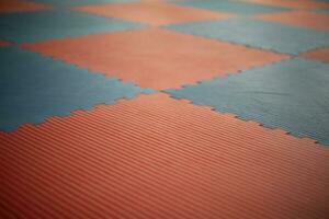 Flooring in gym. Workout mats. Details of gym. photo